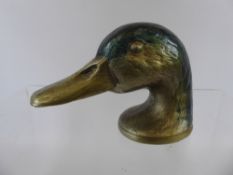 A 'Ducky' Kirby Paris Beard & Co., Metal Bottle Opener, depicting a duck's head.