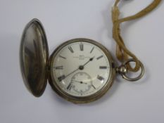 A Gentleman's Silver Full Hunter Pocket Watch, the watch having a white enamel face with baton