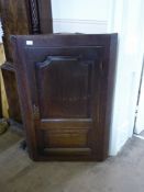 A Oak Corner Cupboard with three shelf areas and two inner drawers to base, approx 33 x 68 x 102