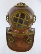 A Miniature Brass/Copper Deep Sea Diver's Helmet.