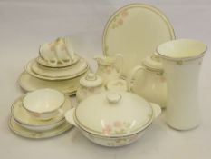 A Royal Doulton 'Twilight Rose' Dinner and Tea Service, comprising of fourteen large dinner