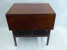 A Gentleman's Mahogany Drop Leaf Table, in the Chippendale style with Chinoisserie fret work