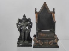 A Harper Metal Money Box in the form of a Coronation throne, marked 'EIIR 1953', approx 21 x 12 x