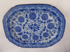 Three Ceramic Plates, including a generous proportioned antique blue and white meat plate approx