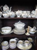 A Wedgwood Kutani Crane Porcelain, comprising a coffee pot, tea pot, two milk jugs, lidded sugar