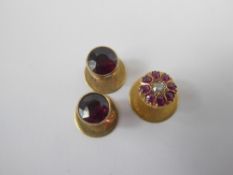 A Gentleman's 18 ct Gold Diamond and Ruby Dress Stud, together with two 9 ct gold garnet dress