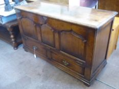 An Oak Reproduction Mule Chest, having panel front with drop, with two drawers beneath, approx 47