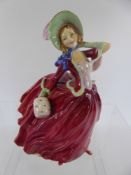 A Royal Doulton "Autumn Breezes" HN1934 Porcelain Figurine, approx 19 cms.