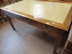 A Mahogany Office Table, having beige leather insert with impressed pattern to border, sturdy reeded