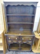 A Bevan Funnell Reprodux Oak Cottage Dresser, with two plate rests, two short drawers, three spice