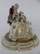 An Italian Luigi Fabris Porcelain Figure, depicting young lovers, approx 16 cms h, painted signature