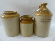 A Stoneware 'Pickup Bros' Ceramic Jug, together with two stoneware flour jars.