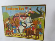 A Bookano Zoo No. 1 Child's Pop Up Book, with two antique card work items. (3)