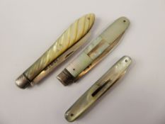 Three Mother of Pearl and Silver Fruit Knives, Sheffield hallmark, dated 1798, the other marks