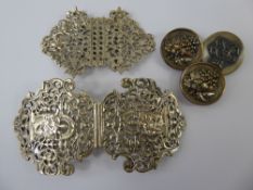 A Silver Nurses's Buckle together with a plated nurses buckle, together with three buttons.