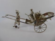 A Chinese Silver Cruet Set, in the form of a rickshaw, the cruet circa 1890, approx 24 cms in