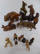 A Collection of European Wooden Animals, including a Brown Bear, Cow, Goat, Squirrel, Beaver, Fox