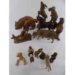 A Collection of European Wooden Animals, including a Brown Bear, Cow, Goat, Squirrel, Beaver, Fox