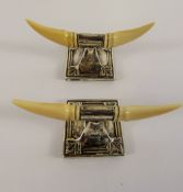 A Pair of Silver and Ivory Knife Rests, the rests in the form of cow's horns, Birmingham hallmark dd