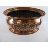 An Art Nouveau Brass Planter, depicting a heraldic shield, approx 28 x 20 cms.