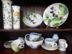 A Collection of Portmeirion China, including three 'Botanic Garden' Vases, four large 'Eden Fruit'