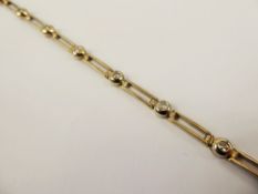 A 9 ct Yellow Gold and Diamond Bracelet, the bracelet having nine diamonds, approx 45 pts, approx 10