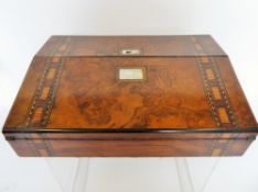 A Victorian Walnut Inlaid Lady's Travelling Writing Box, the box having mother of pearl inlay and