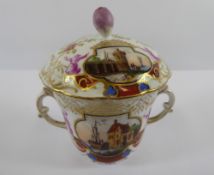 A Dresden Lidded Twin Handled Chocolate Cup and Cover, the cup decorated with oriental figures,