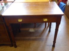 An Oak Writing Desk, with single drawer, on turned legs with two brass cup handles, approx 89 x 60 x