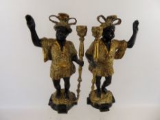 A Pair of Gilt Brass Blackamore Candlesticks, each with feathered headdress, approx 30 cms.