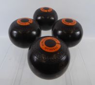 Eclipse Jacques London, a set of four bowling balls labelled for the Evesham Bowling Club.