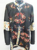 A Chinese Silk Jacket, embroidered with chasing dragons together with black pants. (2)