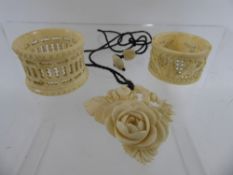 Miscellaneous Bone and Ivory, including a carved mourning locket, rose carved pendant and two