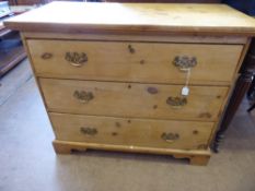 A Vintage Pine Chest of Drawers, on bracket feet with three drawers and brass handles, approx 92 x