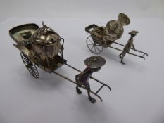 A Pair of Chinese Silver Cruets, in the form of rickshaw.