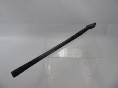 An African Ebony Staff with incised decoration, approx 58 cms.
