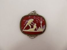 An Antique Sardonyx Cameo Pendant, carved with Hercules wearing the Nemean Lion Skin, contained