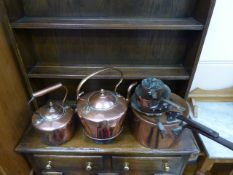 A Quantity of Copper, including two fire side kettles, large jam pan and cover and a pot and pan.