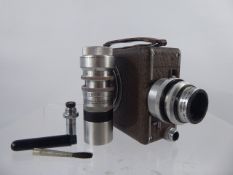 A Vintage Bell & Howell 16 mm Cine Camera, with a Cooke King 1" fl:5 nr 359971 lens in the