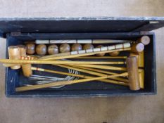 A Vintage Wooden Croquet Set, comprising eight mallets, two colour marker posts, eight balls and ten