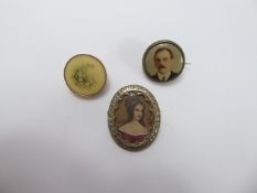 Three Portrait Miniatures, including a photographic brooch stamped 22k, floral pin brooch, miniature