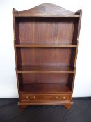 A Mahogany Book Case, having four shelves and a drawer at the bottom, bracket supports, approx 60