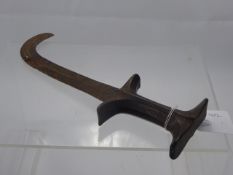 An Antique African Metal Skinning Knife with fullered blade, approx 29 cms.