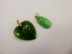 An Apple Green Jade Carved Pendant on 14 ct yellow gold mount , the pendant carvewd with fruit