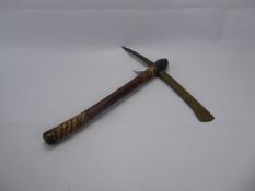 An African Hand-Stitched Hide Pickaxe with incised decorated to brass blade, approx 41 x 38 cms (