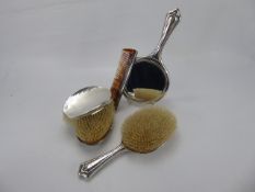 A Lady's Silver Dressing Table Set, comprising hairbrush, double hair brush, mirror and comb,