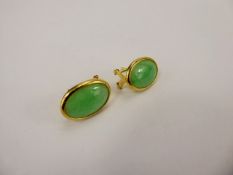 A Pair of 18 ct Yellow Gold Green Jade Earrings, approx 15 x 10 mm, approx wt. 4.7 gms.