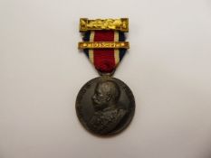 A Good Conduct Medal dated 1913-14, together with two books A Copy of "Donald and his Friends", by