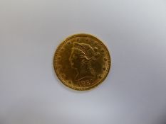 A Solid Gold 1881 United States of America Eagle 10 Dollar Coin, approx 16.7 gms