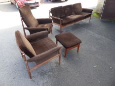 A 20th Century Retro Danish Designer Teak Three Seater Sofa, with two easy chairs one high back